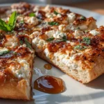 Freshly prepared Honey Ricotta Pizza close-up
