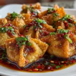 Freshly prepared Spicy Wontons in Chilli Sauce