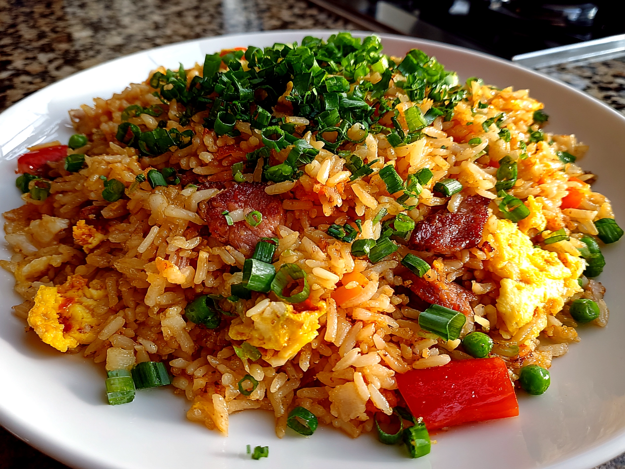 Freshly prepared Bang Bang Fried Rice on white plate